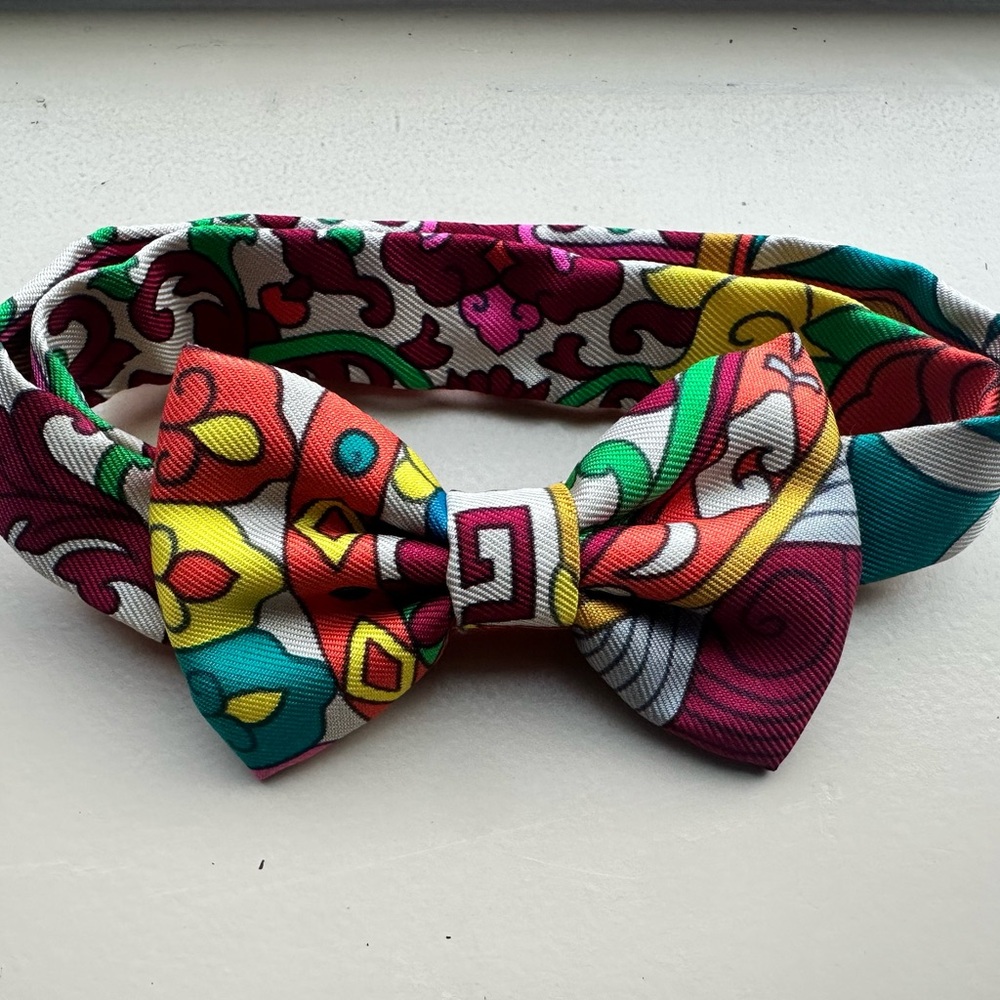 Hermes silk bow tie can be worn around neck or wrist